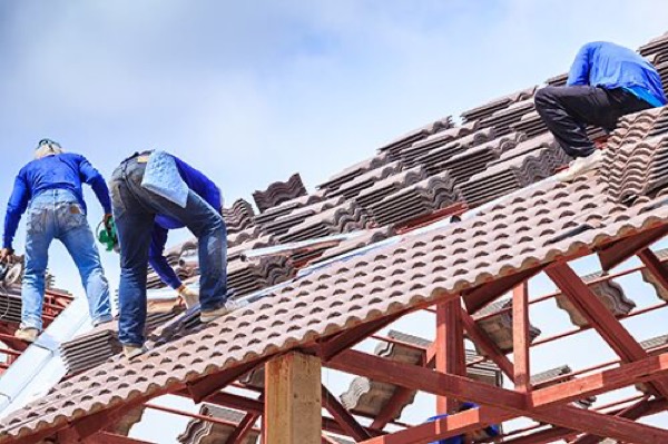bigstock-Worker-Install-Roof-Tile-For-N-116108096-copy-compressor.jpg.jpg